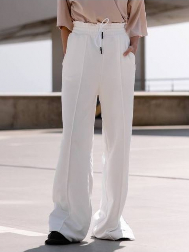 Спортивні штани широкі білі з розрізом