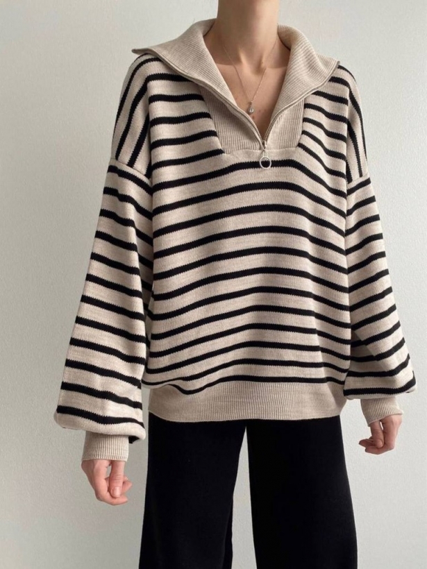 Смугастий светр з блискавкою