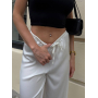 Білі шовкові прямі штани в білизняному стилі