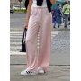 Пудрові шовкові прямі штани в білизняному стилі  Пудрові шовкові прямі штани в білизняному стилі