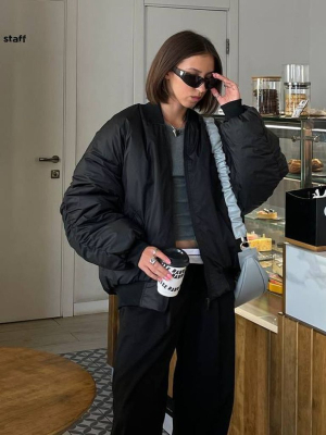 Чорний зимовий подовжений бомбер