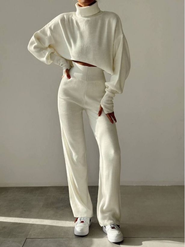 Knitted suit with a crop sweater and wide trousers