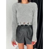 Cropped sweater with a torn bottom