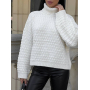 Ажурний теплий светр з високим горлом
