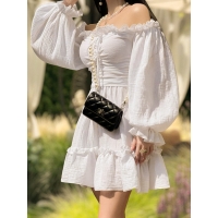 Muslin mini dress with puffed sleeves