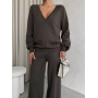 Трикотажний брючний костюм з ажурними вставками