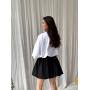 Чорна міні спідниця балон