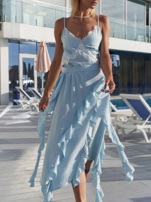 Блакитна лляна сукня з асиметричними рюшами 