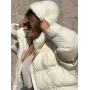 Молочний пуховик oversized з капюшоном