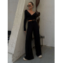 Чорний віскозний костюм з топом та широкими штанами