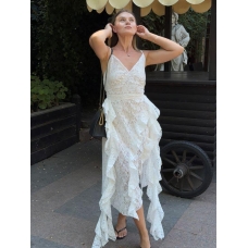 White lace dress with asymmetrical ruffles