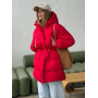 Червоний подовжений зимовий пуховик на кулісці  Червоний подовжений зимовий пуховик на кулісці