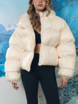 Короткий зимовий пуховик айворі oversize