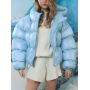 Блакитний короткий зимовий пуховик oversize