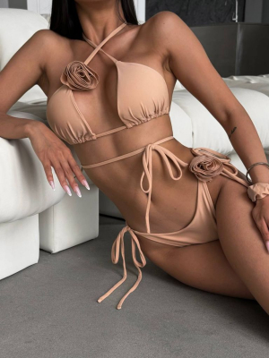 Бежевий купальник на зав'язках з 3D квітами