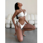 Білий купальник бікіні з вирізами та зав'язками