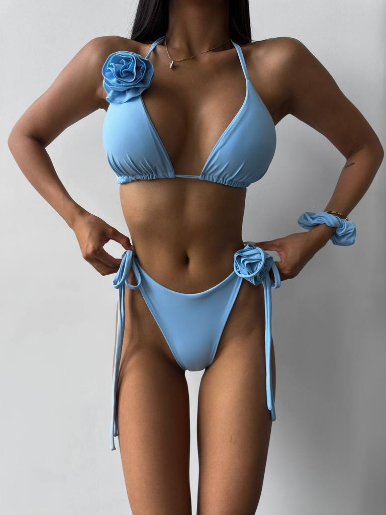 Блакитний купальник на зав'язках з 3D квітами